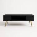 Table basse noire en MDF avec pieds dorés
