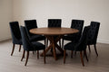 Table ronde en bois avec 7 chaises en tissu noir
